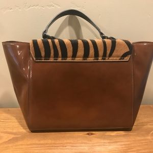 Tan & black leather/horse hair INNUE purse.